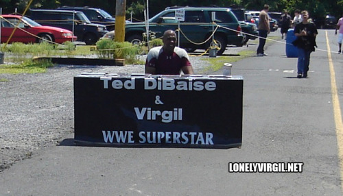 Sometimes when wrestlers do signings, hustlers bring their own table and set up in the parking lot. And by hustlers, I mean wrestlers no one is interested in meeting. At least Virgil got to work on his tan. (source- google image)