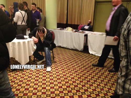Virgil hanging out in that New York hotel Wrestlemania weekend?by himself. The guy in front of him can?t believe Virgil is still doing this. Thanks to @Arda_Ocal for the pic.